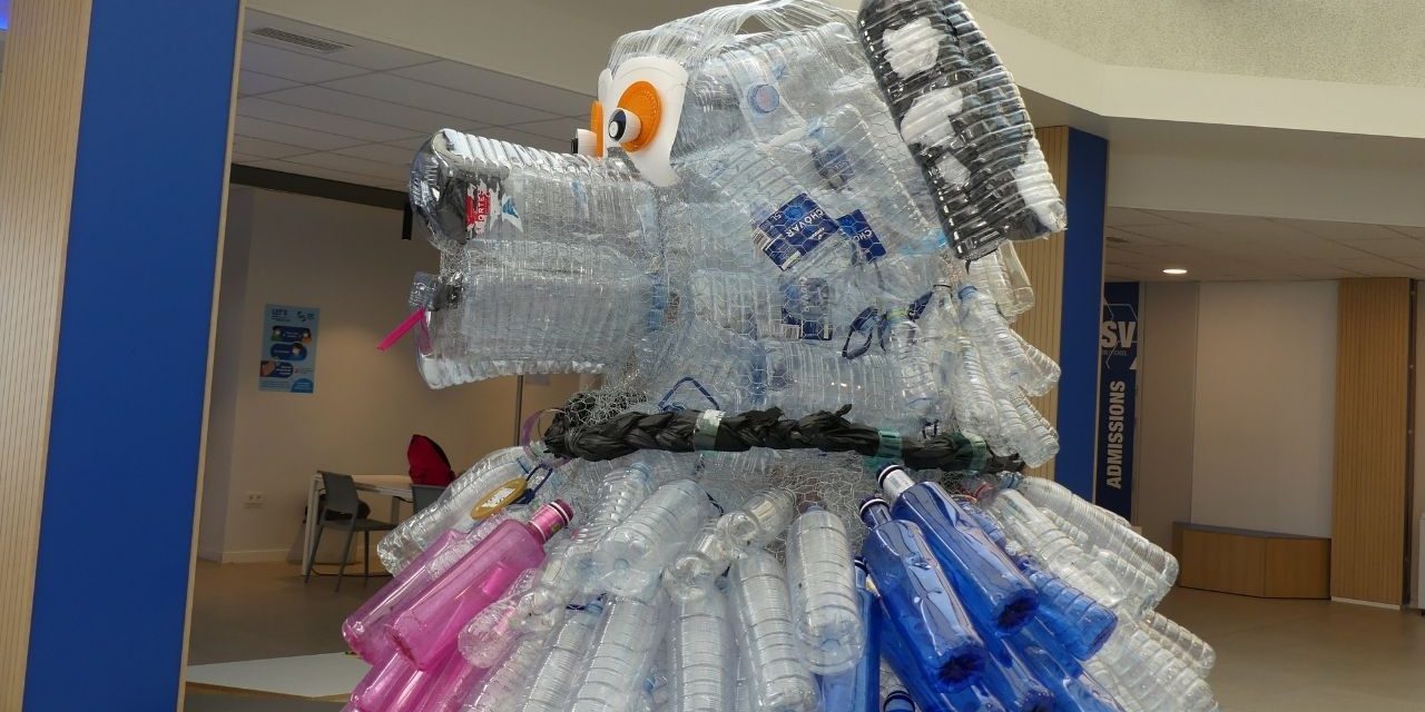 A giant dog made out of recycled plastic bottles at ASV (1) A giant dog made of recycled plastic bottles..the #BigDrawFestival at ASV